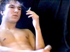 uncircumcised youthful Knut lights cigarette and solo getting off