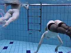 Andreika and Aneta swim naked in the pool