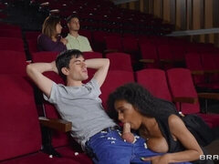 Stylish ebony model Tina Fire fucked in the cinema by white man