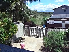 Wife takes a sunbath and shows her naked body to the delivery man