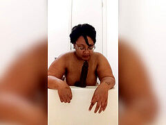 Black chubby female stashes in bathroom to ride her big black dildo