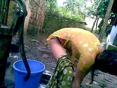 Bangla desi shameless village cousin-Nupur bathing outdoor