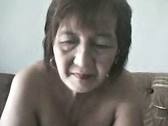 Fat granny asian lady on cam showing merchandise on cam