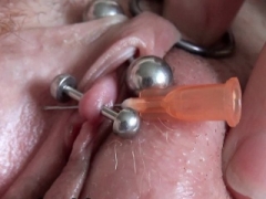 Actual Clitoris piercing and furthermore through with a needle