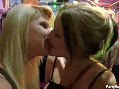 Hot girls passionately kissing with tongues at a wild party