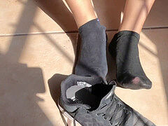 sweat-soaked dark-hued Socks Removal Sweaty soles Close Up