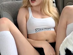 Cute teen shows her pussy in her car