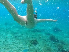 Snorkeling wholly naked with the fish and plus tourists