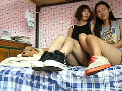 2 japanese women under sneakers