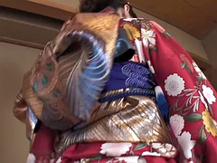 Yuria Tominaga in a kimono gets things stuffed in her pussy