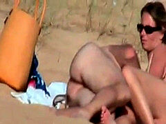Hidden video of French damsel finger-tickled on beach