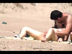 couple split by Strangers on a nude beach