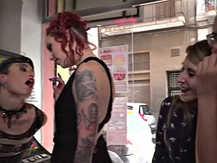 Redhead domina and lord show their naked sub babe in public