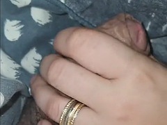 Stepmom perfect handjob under a blanket so her stepson gets a strong erection