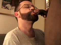 deepthroating a meaty black uncut pecker