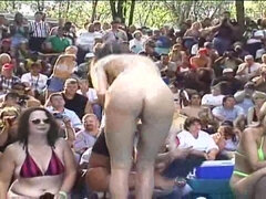 My naked horny wife is fully naked in the public show