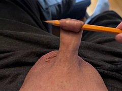 Play with the foreskin of my cock and a pencil