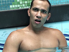Latin American Iago Ribeiro masturbates in the pool, showing his hot cock and enjoying hot in the pool