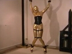 Domina in spandex catsuit tormenting scanty gimp