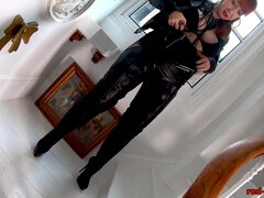 Mischievous mature Red XXX teases in her leather boots