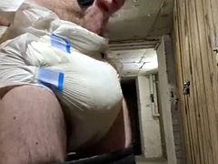 Boy with thick diaper masturbates in public