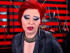 Erotically attractive Red Head Dominatrix Soccer mom Smoking On Cam In Boots