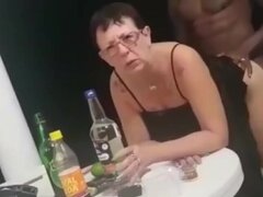 Kinky granny's ass is slammed by a BBC at a party