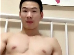 Chinese muscle guy jerks off