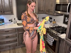 Beautiful TS PAWG strips naked while unpacking and modeling swimsuits