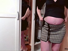 Hot super-sexy pregnant mom attempting on her narrow dress on huge pregnant belly