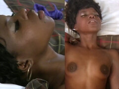 A black girl with large nipples on her tiny tits is sitting on a flag pole