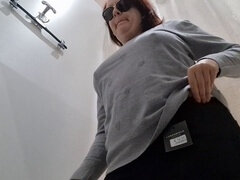 Naughty sounds of gas released in the dressing room of a clothing store