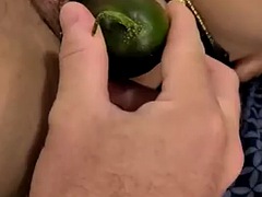Cucumber in pussy and ass