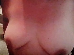 I masturbate on the side of the bed to feel pleasure in my tight pussy