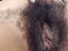 Inexperienced girl closeup of natural hairy bush