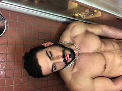Muscular hunk takes a solo shower