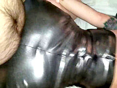 red-haired latex kitten gets porked and cum on boots