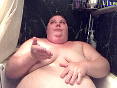 Obese girl, bath tub, tub