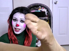 gorgeous Clown lady shows off how Big her soles are