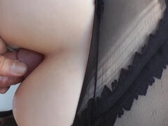 Blonde in stockings is in a pov video, moving her hand over a flag pole