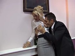Fully clothed secretary rides and sucks a cock