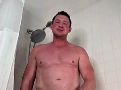 Solo handsome amateur hunk wanks his cock in the shower