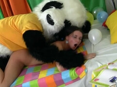 Hot woman is getting fucked by a guy that is in a panda costume