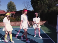 Female tennis players work as a team during outdoor threesome sex