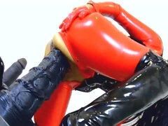 Nasty wife is wearing latex and fucking a humongous toy