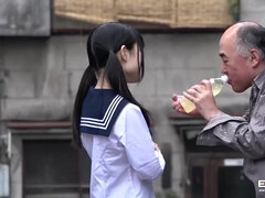 Charming Japanese schoolgirl gives blowjob to a lucky old fella