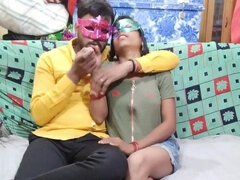 Indian husband making a nice show with the masked wife