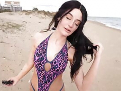Beautiful teen bikini model strips naked on a public beach