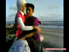 Indonesian- hijab girl fucks on the beach