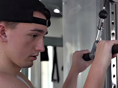 Handsome guy in the gym massages and fucks a twink with a muscle fetish